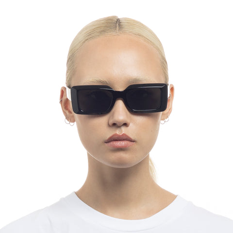 Aire Parallax Black Uni-Sex Rectangle Sunglasses | Eyewear Index