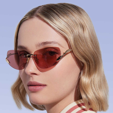 Karen Walker Fleur Gold Female Wrap Sunglasses | Eyewear Index