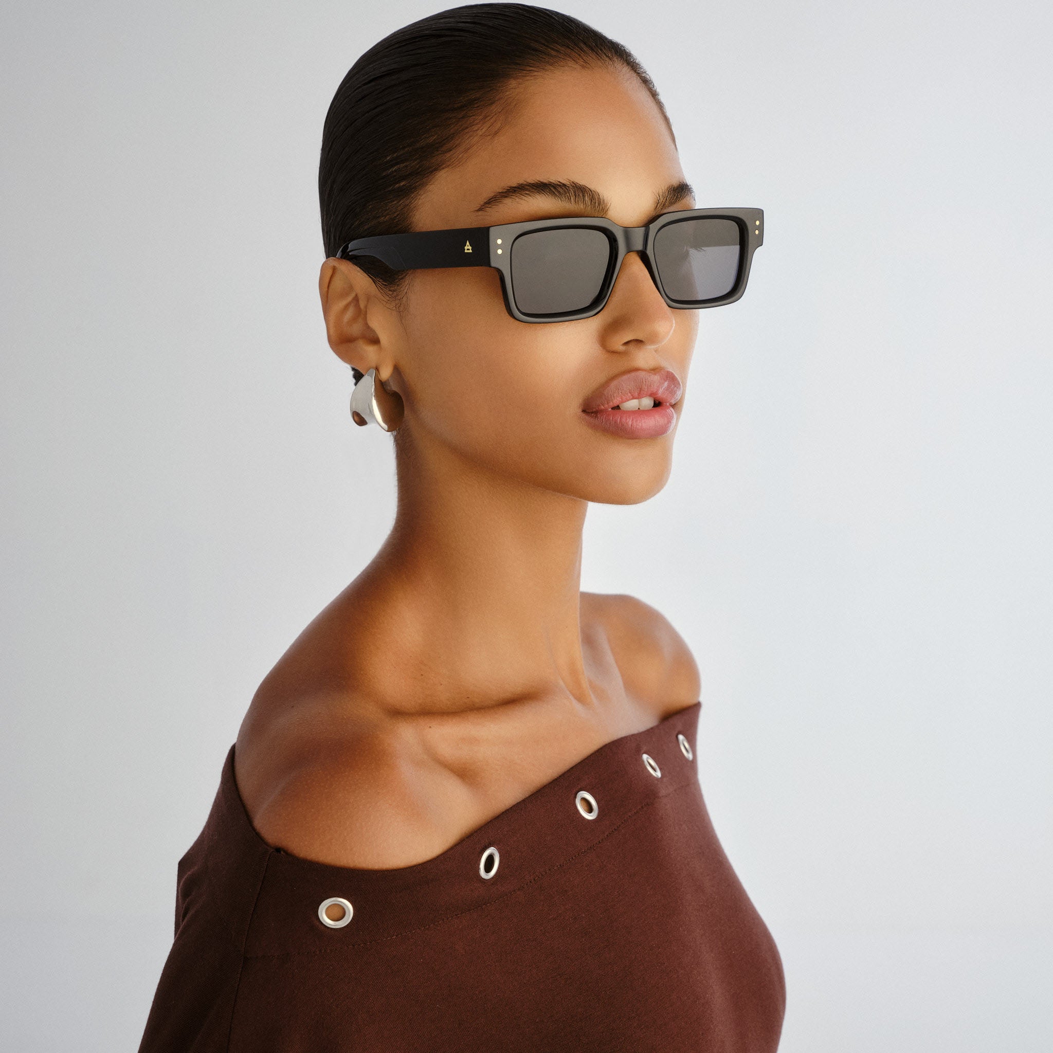 Aire Aeron Black Uni-Sex Rectangle Sunglasses | Eyewear Index