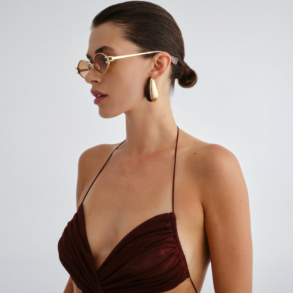 Le Specs Numero Quince Gold Female Oval Sunglasses | Eyewear Index