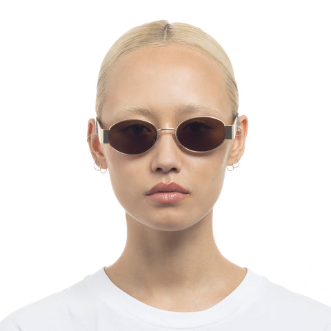 Aire Mars Satin Gold Charcoal Tort Uni-Sex Oval Sunglasses | Eyewear Index